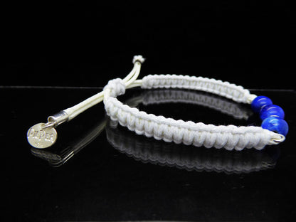 Armband Weiß mit 3x Lapiskugel